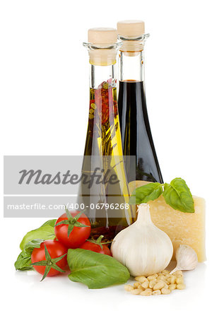 Tomatoes, basil, olive oil, vinegar, garlic and parmesan cheese. Isolated on white background