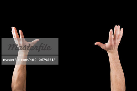 Hands up in the air like holding something isolated on black background