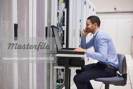 Man maintaining the servers in data center