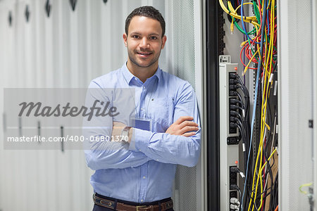 Technician standing next to the data store in hallway