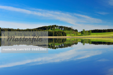 Landscape and Sky Reflecting in Lake, Sameister Weiher, Rosshaupten, Bavaria, Germany