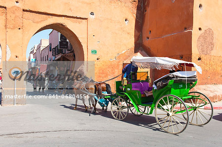 Tourists in Marrakech enjoying a horse and cart ride around the old medina, Marrakech, Morocco, North Africa, Africa Tourists in Marrakech enjoying a horse and cart ride around the old medina, Marrakech, Morocco, North Africa, Africa
