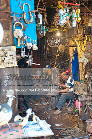 Carpenter and metalworker in his workshop in the souk, Old Medina, Marrakech, Morocco, North Africa, Africa