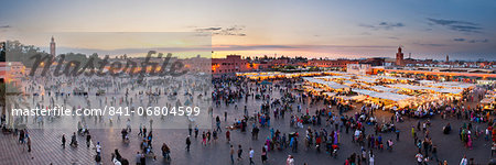 Food stalls, people and Koutoubia Mosque at sunset, Place Djemaa el Fna, Marrakech, Morocco, North Africa, Africa Food stalls, people and Koutoubia Mosque at sunset, Place Djemaa el Fna, Marrakech, Morocco, North Africa, Africa