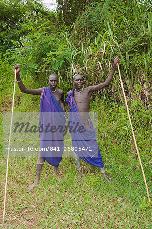 Two Surma men with scarification, Tulgit, Omo River Valley, Ethiopia, Africa