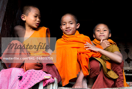 Three novice monks in village near Kengtung (Kyaingtong), Shan State, Myanmar (Burma), Asia
