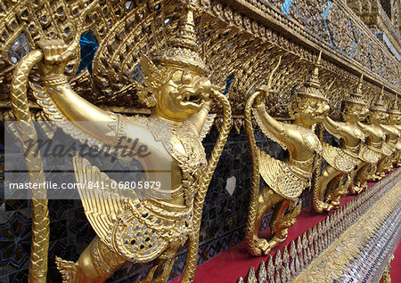 Garudas and nagas on external decorations of the Ubosoth, Wat Phra Kaew temple, Grand Palace, Bangkok, Thailand Garudas and nagas on external decorations of the Ubosoth, Wat Phra Kaew temple, Grand Palace, Bangkok, Thailand