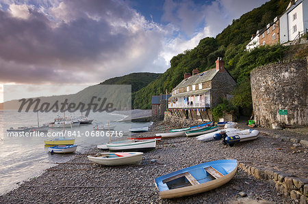 Fishing boats on the pebble beach in Clovelly harbour at dawn, Devon, England, United Kingdom, Europe