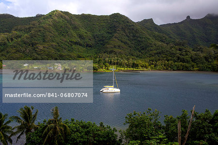 A cruise catamaran in the bay of Hamanee in Tahaa, French Polynesia, Pacific Islands, Pacific