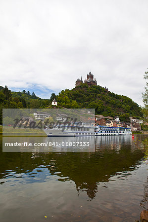 River cruise ship below castle Cochem on the River Moselle, Rhineland-Palatinate, Germany, Europe