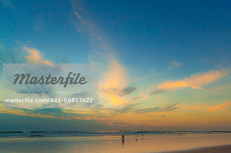 Pacific sunset at popular Playa Guiones surf beach, Nosara, Nicoya Peninsula, Guanacaste Province, Costa Rica, Central America