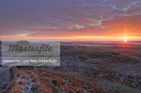 Sunrise and Hadrian's Wall National Trail in winter, looking to Housesteads Fort, Hadrian's Wall, UNESCO World Heritage Site, Northumberland, England, United Kingdom, Europe