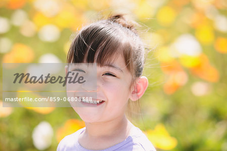 Young girl smiling at camera