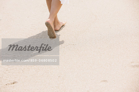 Woman walking on the beach