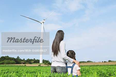 Mother and daughter in a vegetable field