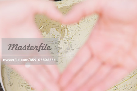 Hands and globe