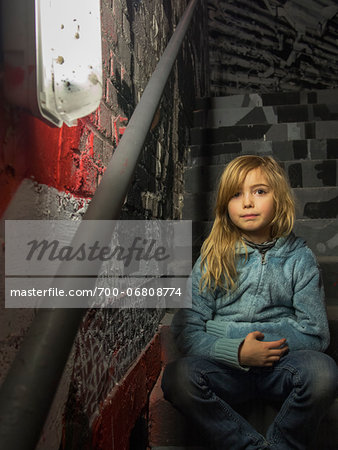 Young girl in stairwell of Palais de Tokyo, Paris, France