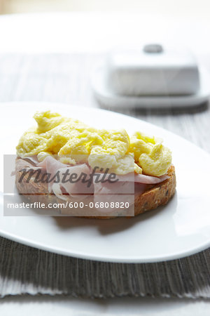 Multigrain Toast with Scrambled Eggs and Ham, Studio Shot