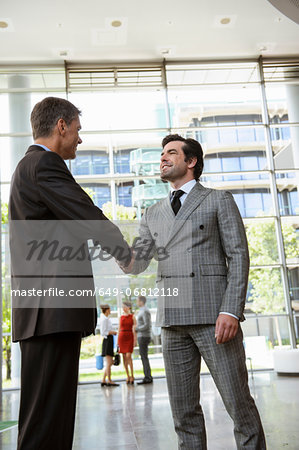 Two businessmen shaking hands