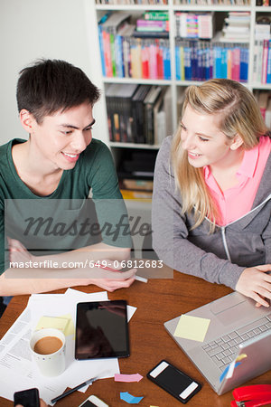 Students working on laptop, high angle