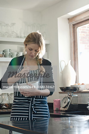 Woman stirring cake mixture