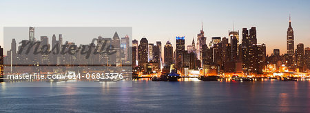 Panoramic view Manhattan skyline and waterfront at dusk, New York City, USA