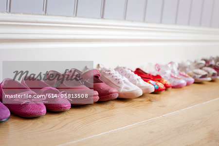 Child's shoes in a row Child's shoes in a row