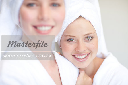 Young women with towels on heads in spa