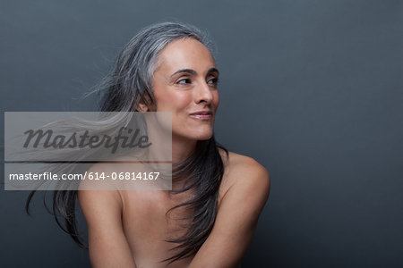 Mature woman with windswept hair