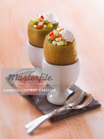 Kiwis filled with strawberries and apple