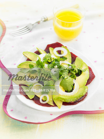Beetroot and avocado carpaccio with coriander and lemon