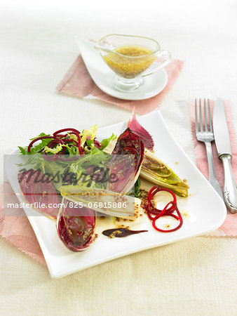 Red and yellow chicory salad with mustard sauce