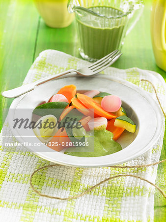 Steamed vegetables with green lentil and coconut milk sauce