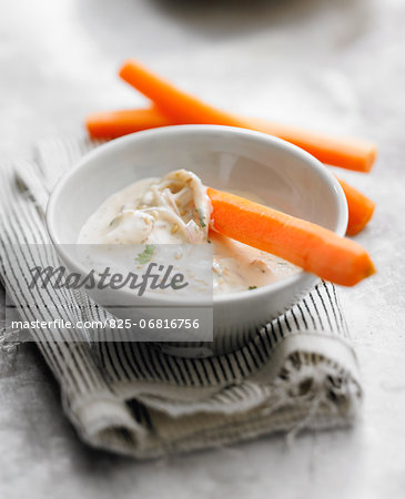 Raw carrots with yoghurt,onion and sesame seed dip sauce