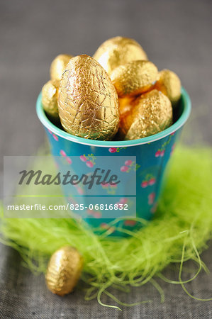 Chocolate Easter eggs in golden wrapping