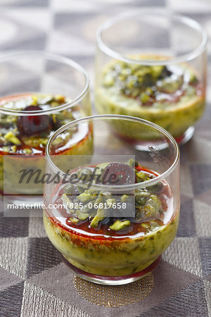 Pistachio cream dessert with stewed cherries Pistachio cream dessert with stewed cherries