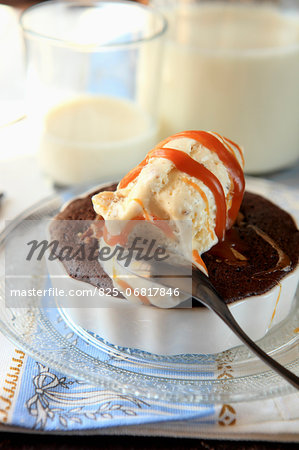 Individual chocolate cake with vanilla ice cream and toffee sauce