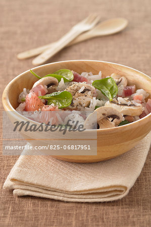 Long grain rice salad with diced bacon,grapefruit,mushrooms and fresh spinach