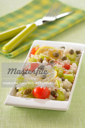 Long grain rice salad with cherry tomatoes,celery stalks and confit citrus