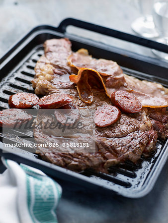 Grilled entrecôte with chorizo and bacon