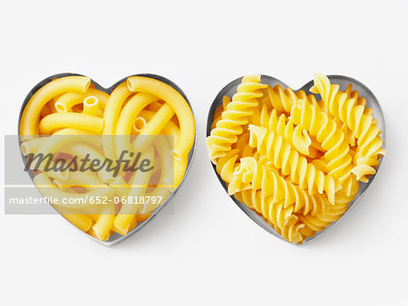 Assorted pasta in heart-shaped biscuit cutters