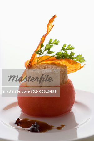 Tuna  soufflé served in a tomato