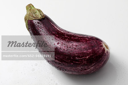 Striped eggplant on a white background