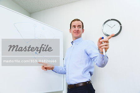 Businessman explaining project Businessman explaining project