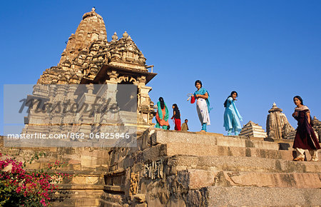 Asia, India, Madhya Pradesh, Khajuraho. Kandariya Mahadev Temple, western group. Indian tourists enjoy looking around. Asia, India, Madhya Pradesh, Khajuraho. Kandariya Mahadev Temple, western group. Indian tourists enjoy looking around.