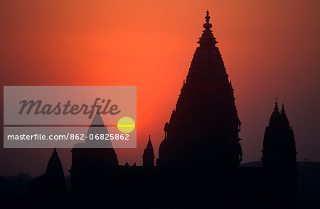 Asia, India, Madhya Pradesh, Orchha.  Sunset over the skyline of Orchha showing the spires of Chaturbhuj temple.