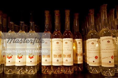 North Italy, Trentino, Alto Adige, Sud Tirol, Merano. The famed northern Italian grappa in different bottles on display in a shop