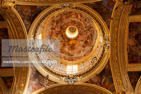 Northern Italy, Italian Riviera, Liguria, Genova. A painted cupola in one of the numerous churches