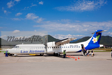 Laos, Luang Prabang.  A Lao Airlines aeroplane about to depart from Luang Prabang airport.