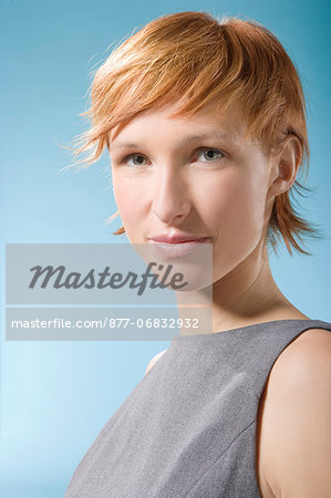 Portrait of woman on light blue background